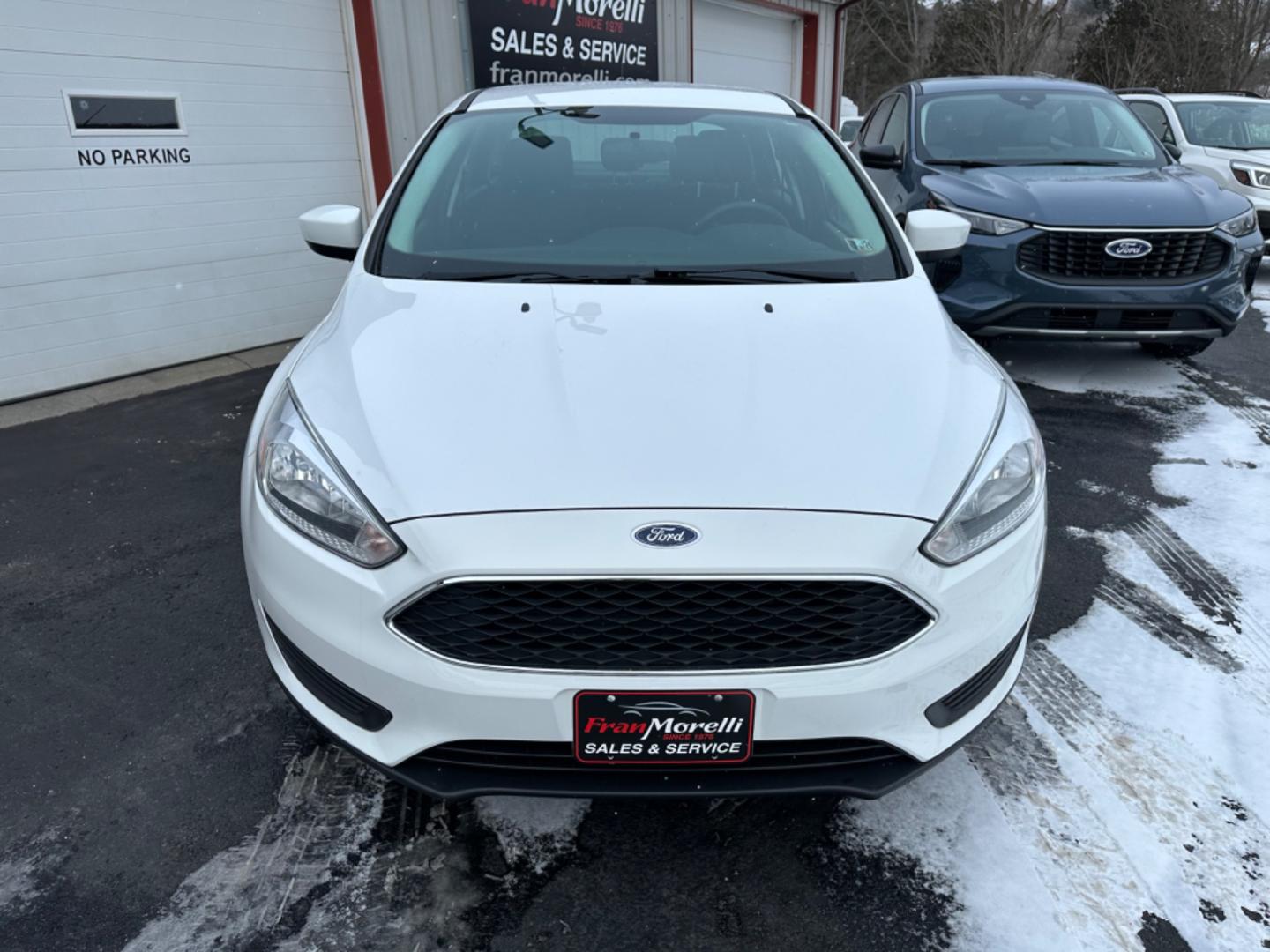 2018 White Ford Focus SE Sedan (1FADP3F20JL) with an 2.0L L4 DOHC 16V engine, Auto transmission, located at 8464 Route 219, Brockway, PA, 15824, (814) 265-1330, 41.226871, -78.780518 - Clean, well taken care of Ford Focus Se Sedan with 4 cylinder engine, air condition, power windows and locks, factory alloys and only 71000 miles. This pre owned car has been serviced, Pa-Inspected, and comes with warranty. Stop in or call one of the Morelli boys today to see this car which is pric - Photo#13